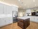 Spacious kitchen with large island, stainless steel appliances, and tile flooring throughout the area at 5340 N Campbell Rd, Las Vegas, NV 89149
