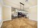 Expansive living area with tiled flooring, linking kitchen and living spaces for seamless entertaining at 5340 N Campbell Rd, Las Vegas, NV 89149