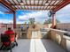 Covered outdoor kitchen featuring granite countertops, stainless steel appliances, and ample counter space at 5340 N Campbell Rd, Las Vegas, NV 89149