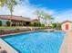 Gorgeous backyard with sparkling pool, a built-in spa and ample patio space perfect for outdoor relaxation and entertainment at 5340 N Campbell Rd, Las Vegas, NV 89149