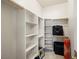 Spacious walk-in closet with built-in shelving and ample storage for organization at 671 W Hickory St, Pahrump, NV 89048