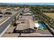 An aerial view of a neighborhood with lush landscaping and mountain views at 7119 Falabella Ridge Ave, Las Vegas, NV 89131
