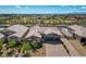 A beautiful aerial view of a neighborhood with lush landscaping and mountain views at 7119 Falabella Ridge Ave, Las Vegas, NV 89131