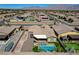 Overhead angle showcases the backyard pool, spa, fire pit, and nearby desert landscaping at 7119 Falabella Ridge Ave, Las Vegas, NV 89131