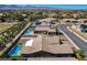 Beautiful single Gathering home with nearby desert landscaping, pool, trees, and privacy fence at 7119 Falabella Ridge Ave, Las Vegas, NV 89131