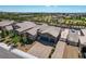 An aerial view of a home featuring a well-manicured lawn and a private pool at 7119 Falabella Ridge Ave, Las Vegas, NV 89131