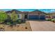 Charming single Gathering home with a two-car garage and tasteful landscaping at 7119 Falabella Ridge Ave, Las Vegas, NV 89131