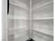Walk-in pantry with white shelving and ample storage space at 7119 Falabella Ridge Ave, Las Vegas, NV 89131