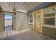 Cozy patio with brick pavers, pergola and access to the backyard area, perfect for relaxing or entertaining guests at 7119 Falabella Ridge Ave, Las Vegas, NV 89131