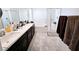 Spacious bathroom featuring a double vanity and a separate shower and tub at 760 Crisp Morning Ct, North Las Vegas, NV 89086