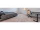Cozy bedroom featuring carpet and a desk with modern chair and a bed at 760 Crisp Morning Ct, North Las Vegas, NV 89086