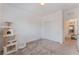This cozy bedroom offers neutral carpeting and ample closet space for comfortable living at 760 Crisp Morning Ct, North Las Vegas, NV 89086
