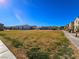 Expansive green space provides a communal area for recreation and relaxation within the neighborhood at 760 Crisp Morning Ct, North Las Vegas, NV 89086