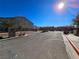 A view of the black metal access gate that leads into the community at 760 Crisp Morning Ct, North Las Vegas, NV 89086
