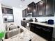 Stylish kitchen equipped with stainless steel appliances, granite countertops, and ample cabinet space at 760 Crisp Morning Ct, North Las Vegas, NV 89086