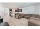 Open concept living area with tile floors, and a modern kitchen with a breakfast bar at 760 Crisp Morning Ct, North Las Vegas, NV 89086