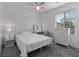 Bright bedroom with a large window and vanity area at 9316 Golden Lad Ave, Las Vegas, NV 89166