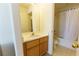 Clean bathroom features a vanity and a separate shower-tub, providing convenience at 9935 Swimming Hole St, Las Vegas, NV 89183
