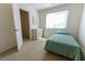 Bright bedroom with natural light, a closet, and neutral walls for a cozy and calming atmosphere at 9935 Swimming Hole St, Las Vegas, NV 89183