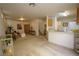 Spacious living room and kitchen combo offers a versatile layout with ample natural light and open floor plan at 9935 Swimming Hole St, Las Vegas, NV 89183