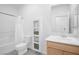 Bathroom with vanity, sink, ample counter space, a shower-tub combination, and tile flooring at 10009 Locking Biner Ave, Las Vegas, NV 89166