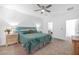 Spacious main bedroom with plush carpet, ensuite bathroom, and neutral decor at 10009 Locking Biner Ave, Las Vegas, NV 89166
