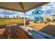 Community playground with picnic shelter and a blue slide, perfect for Gathering fun at 10009 Locking Biner Ave, Las Vegas, NV 89166