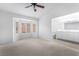 Spacious bedroom with bay window, neutral carpet and ensuite access at 10041 Arbuckle Dr, Las Vegas, NV 89134