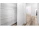 Walk-in closet with shelving and access to the hallway and kitchen at 10041 Arbuckle Dr, Las Vegas, NV 89134