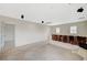 Spacious carpeted loft featuring recessed lighting and two windows, perfect for entertaining at 10265 Franford Ct, Las Vegas, NV 89183
