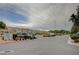 Community street view with a variety of parked cars and neighborhood homes at 10265 Franford Ct, Las Vegas, NV 89183