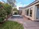 Private backyard featuring a relaxing hot tub area and lush greenery for a tranquil retreat at 10705 Arundel Ave, Las Vegas, NV 89135