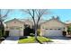 Charming single-story home with a well-manicured lawn and a three-car garage at 10705 Arundel Ave, Las Vegas, NV 89135