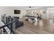 Upstairs game room features a pool table, media center, and exercise equipment at 12 Olympia Chase Dr, Las Vegas, NV 89141