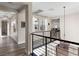 Hallway showcasing modern design with sleek railings and views into the adjacent rooms at 12 Olympia Chase Dr, Las Vegas, NV 89141