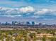 Breathtaking view of the Las Vegas skyline and surrounding mountains, showcasing the city's vibrant landscape at 12 Olympia Chase Dr, Las Vegas, NV 89141