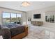 Spacious main bedroom with a luxurious bed, a modern dresser, and stunning views of the pool at 12 Olympia Chase Dr, Las Vegas, NV 89141