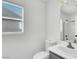 Bathroom featuring a vanity sink, toilet, and walk-in shower at 1203 Sweet Orange St, Las Vegas, NV 89142