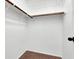 Open closet with carpet flooring and shelving system for storage at 1203 Sweet Orange St, Las Vegas, NV 89142