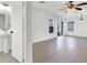 Bright and spacious living room featuring tile floors and backyard access at 1203 Sweet Orange St, Las Vegas, NV 89142