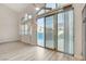 Bright and airy space with sliding glass doors to outside the outdoor pool area at 1700 Wandering Winds Way, Las Vegas, NV 89128