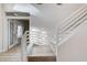 Bright stairway features contemporary railing and natural light at 1700 Wandering Winds Way, Las Vegas, NV 89128
