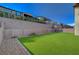 Long backyard with a putting green at 195 Cactus Sunrise St, Las Vegas, NV 89138