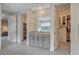 Bathroom with vanity and mirror in between entrances to walk-in closets at 195 Cactus Sunrise St, Las Vegas, NV 89138