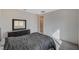 Bedroom featuring a cozy bed, dresser and mirror, and ample space for comfort and convenience at 195 Cactus Sunrise St, Las Vegas, NV 89138