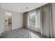 Bedroom with large windows and ensuite bathroom access at 195 Cactus Sunrise St, Las Vegas, NV 89138