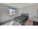 Cozy bedroom with comfortable bed, natural light, and minimalist decor, ideal for relaxation at 195 Cactus Sunrise St, Las Vegas, NV 89138