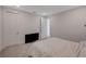 Serene bedroom with a comfortable bed, TV, and neutral decor, offering a tranquil and inviting space at 195 Cactus Sunrise St, Las Vegas, NV 89138