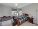 Comfortable bedroom featuring a basketball hoop, a cozy bed, and a window with outside views at 195 Cactus Sunrise St, Las Vegas, NV 89138