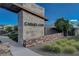 Elegant Carmel Cliff community entrance featuring stone signage and well-maintained landscaping at 195 Cactus Sunrise St, Las Vegas, NV 89138